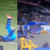 Suryakumar Yadav falling on field after smashing a six