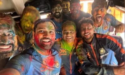 Team India playing Holi