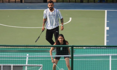 Virat Kohli and Anushka Sharma playing Badminton