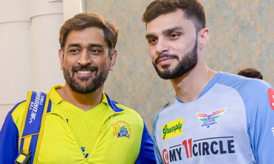 MS Dhoni and Naveen-Ul-Haq