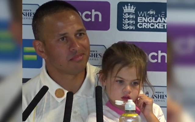 Usman Khawaja with his daughter
