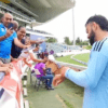 Virat Kohli with his young fan