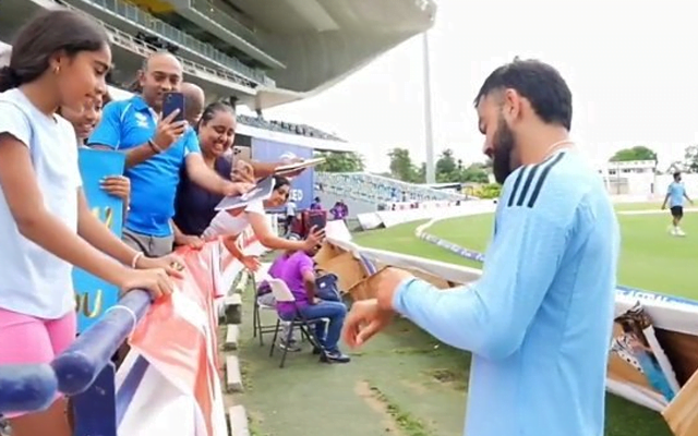 Virat Kohli with his young fan