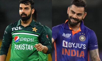 Shadab Khan and Virat Kohli