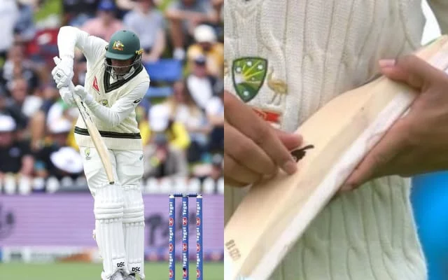 Usman Khawaja removes sticker from bat